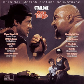 "Meet Me Half Way" by Kenny Loggins "Meet Me Half Way" by Kenny Loggins